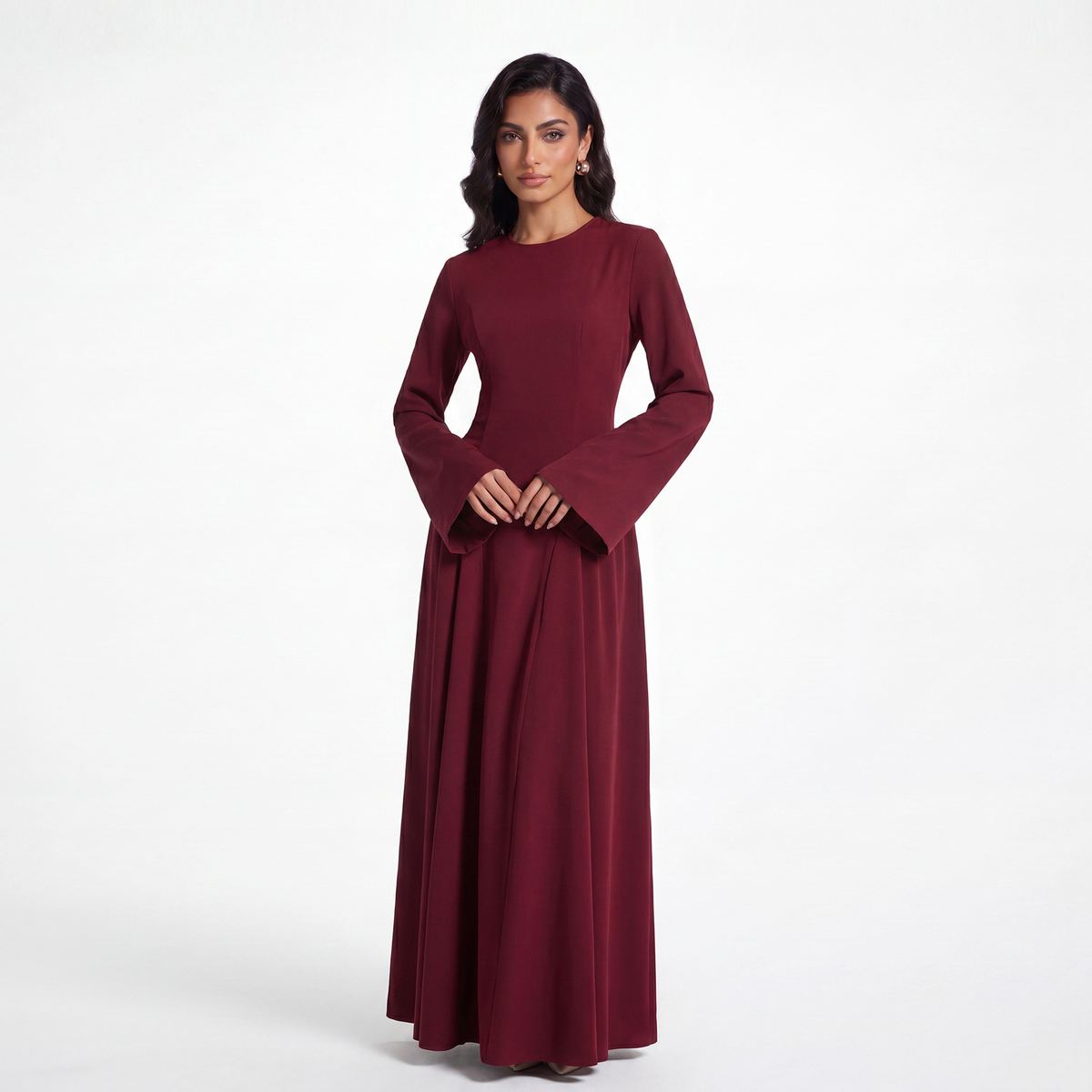 Model in a deep burgundy wide-skirt maxi dress