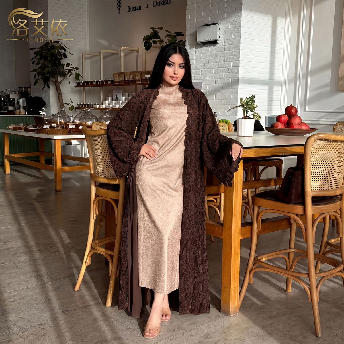 Model in a deep brown flocked lace open robe with inner dress