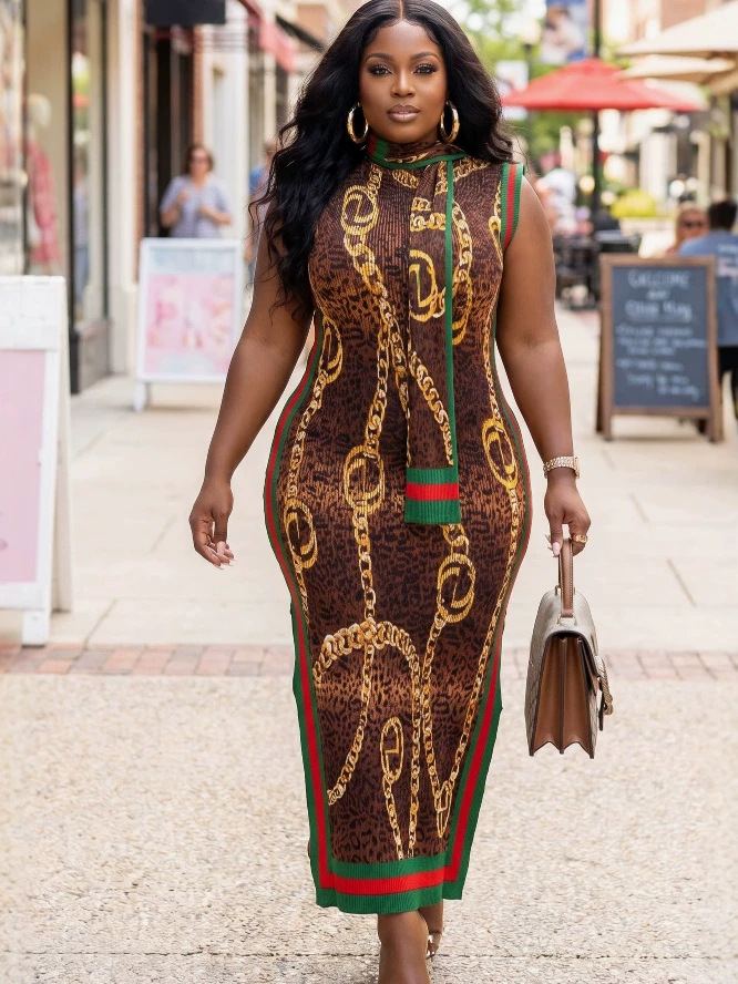 Plus-size printed pleated maxi dress with leopard print and gold chain pattern